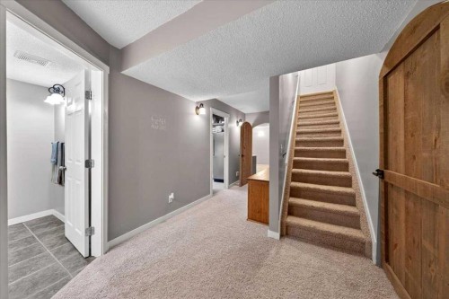 127 Hidden Ranch Terrace Nw, Calgary, AB - Indoor Photo Showing Other Room
