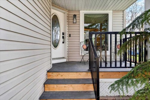 127 Hidden Ranch Terrace Nw, Calgary, AB - Outdoor With Deck Patio Veranda With Exterior