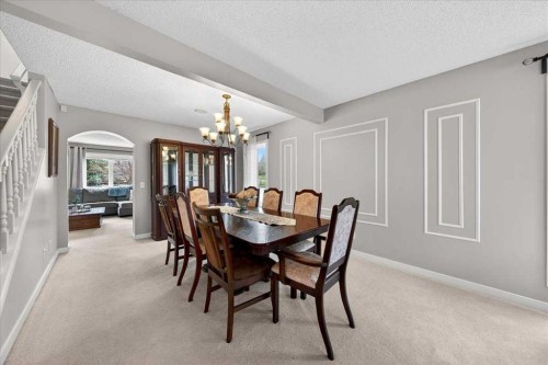127 Hidden Ranch Terrace Nw, Calgary, AB - Indoor Photo Showing Dining Room