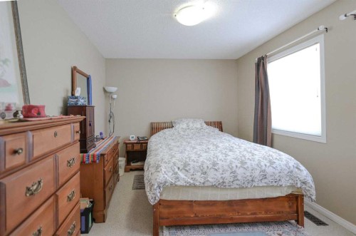 125 Silverado Range Cove Sw, Calgary, AB - Indoor Photo Showing Bedroom