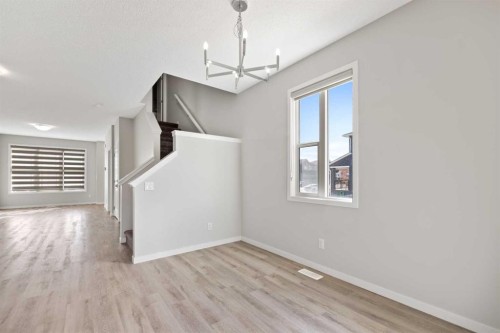 281 Creekside Boulevard Sw, Calgary, AB - Indoor Photo Showing Other Room