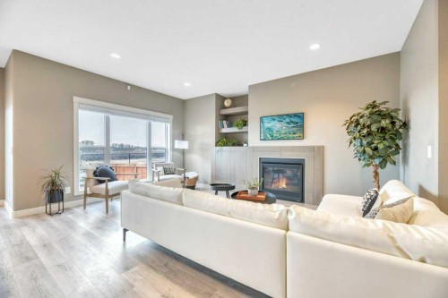 261 Wildrose Drive, Strathmore, AB - Indoor Photo Showing Living Room With Fireplace