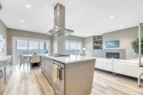 261 Wildrose Drive, Strathmore, AB - Indoor Photo Showing Kitchen With Fireplace With Upgraded Kitchen