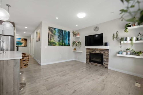 439 Bayview Way Sw, Airdrie, AB - Indoor With Fireplace