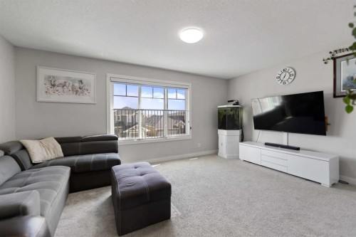 439 Bayview Way Sw, Airdrie, AB - Indoor Photo Showing Living Room