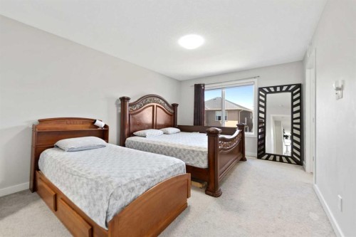 439 Bayview Way Sw, Airdrie, AB - Indoor Photo Showing Bedroom