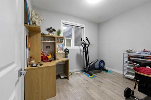 439 Bayview Way Sw, Airdrie, AB - Indoor Photo Showing Gym Room
