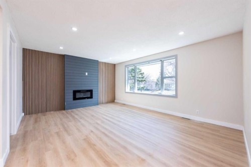 46 Marbrooke Circle Ne, Calgary, AB - Indoor Photo Showing Other Room With Fireplace