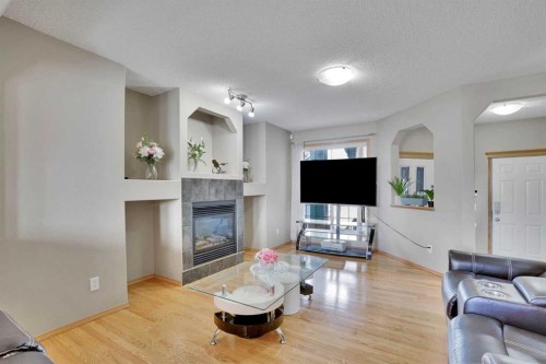 75 Taralea Crescent Ne, Calgary, AB - Indoor Photo Showing Living Room With Fireplace