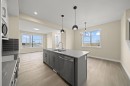 9 Sora Gate Se, Calgary, AB  - Indoor Photo Showing Kitchen With Double Sink With Upgraded Kitchen 
