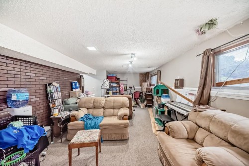 129 Dovertree Place Se, Calgary, AB - Indoor Photo Showing Living Room