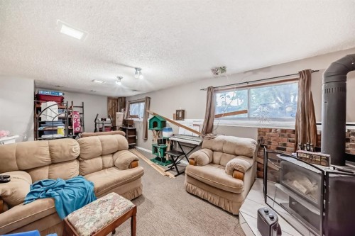 129 Dovertree Place Se, Calgary, AB - Indoor Photo Showing Living Room