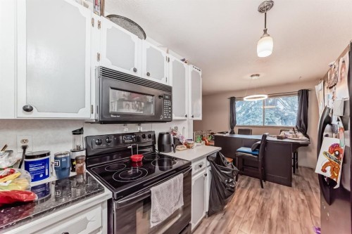 129 Dovertree Place Se, Calgary, AB - Indoor Photo Showing Kitchen