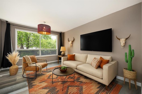 92 Erin Woods Drive Se, Calgary, AB - Indoor Photo Showing Living Room