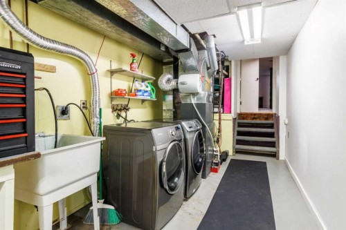 92 Erin Woods Drive Se, Calgary, AB - Indoor Photo Showing Laundry Room