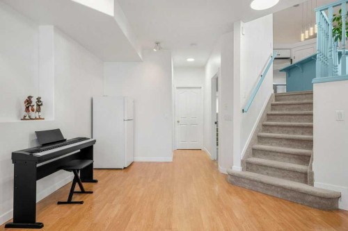 195 Somerglen Common Sw, Calgary, AB - Indoor Photo Showing Other Room