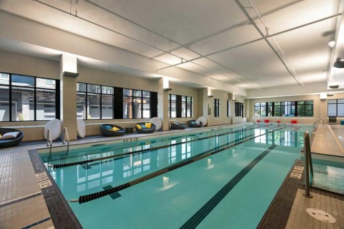 212-12 Mahogany Path Se, Calgary, AB - Indoor Photo Showing Other Room With In Ground Pool