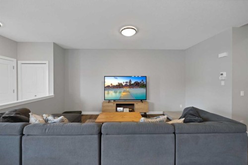1167 Channelside Drive Sw, Airdrie, AB - Indoor Photo Showing Living Room