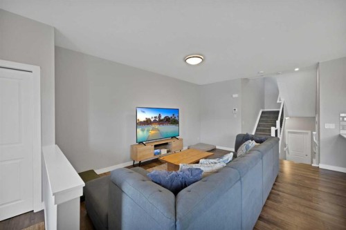 1167 Channelside Drive Sw, Airdrie, AB - Indoor Photo Showing Living Room
