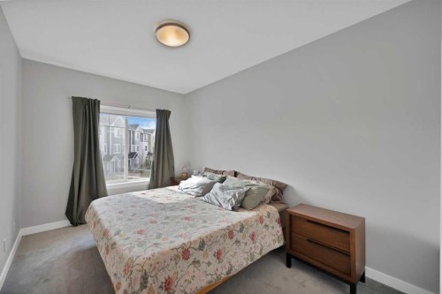 1167 Channelside Drive Sw, Airdrie, AB - Indoor Photo Showing Bedroom