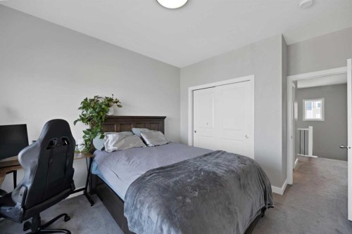 1167 Channelside Drive Sw, Airdrie, AB - Indoor Photo Showing Bedroom
