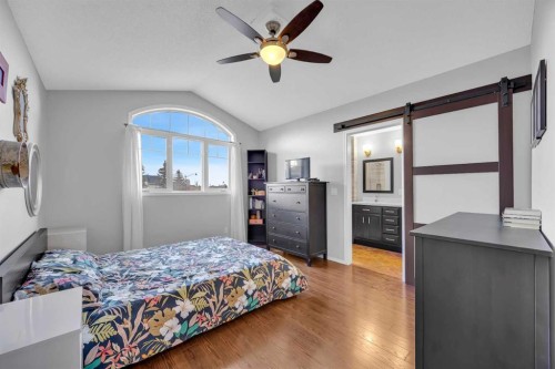 266 Cougarstone Circle Sw, Calgary, AB - Indoor Photo Showing Bedroom