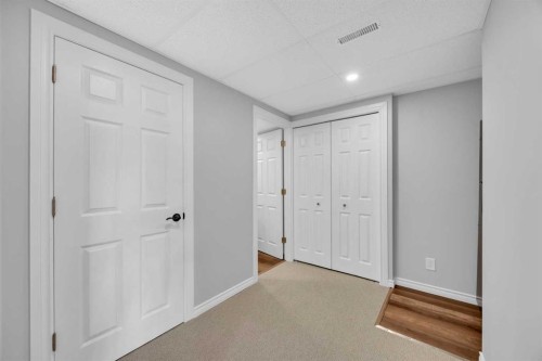 266 Cougarstone Circle Sw, Calgary, AB - Indoor Photo Showing Other Room