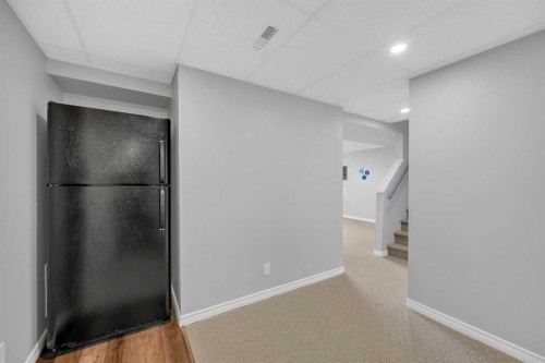 266 Cougarstone Circle Sw, Calgary, AB - Indoor Photo Showing Other Room