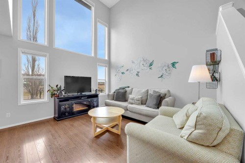 266 Cougarstone Circle Sw, Calgary, AB - Indoor Photo Showing Living Room