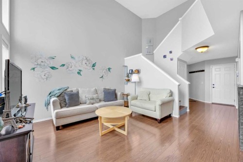 266 Cougarstone Circle Sw, Calgary, AB - Indoor Photo Showing Living Room