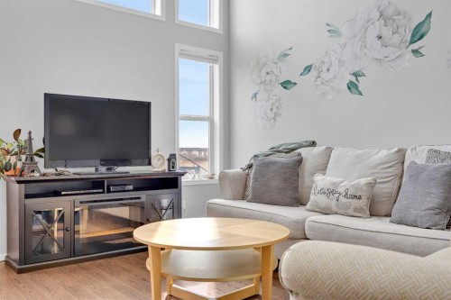 266 Cougarstone Circle Sw, Calgary, AB - Indoor Photo Showing Living Room