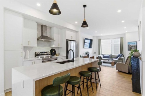 35-903 Mahogany Boulevard Se, Calgary, AB - Indoor Photo Showing Kitchen With Stainless Steel Kitchen With Double Sink With Upgraded Kitchen