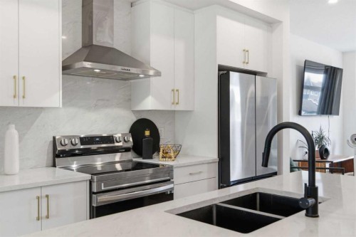35-903 Mahogany Boulevard Se, Calgary, AB - Indoor Photo Showing Kitchen With Stainless Steel Kitchen With Double Sink With Upgraded Kitchen
