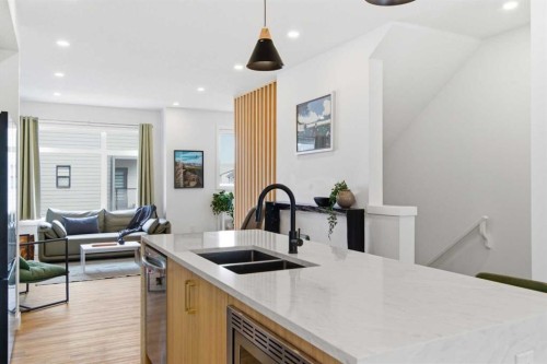 35-903 Mahogany Boulevard Se, Calgary, AB - Indoor Photo Showing Kitchen With Double Sink With Upgraded Kitchen