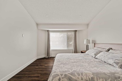 16 Douglasview Park Se, Calgary, AB - Indoor Photo Showing Bedroom