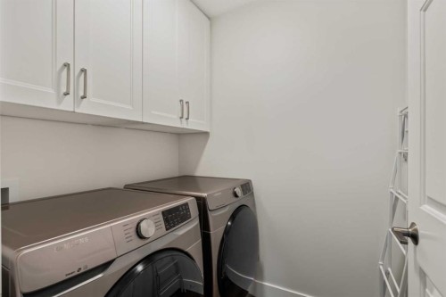 16 Douglasview Park Se, Calgary, AB - Indoor Photo Showing Laundry Room