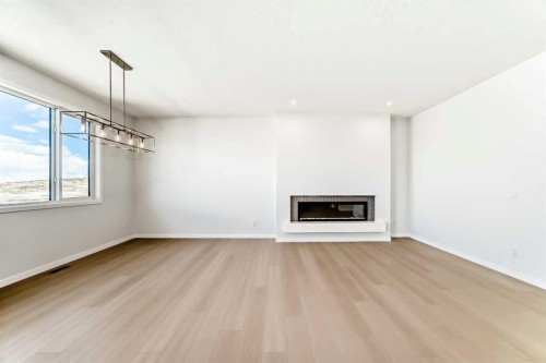 396 Herron Landing Ne, Calgary, AB - Indoor With Fireplace