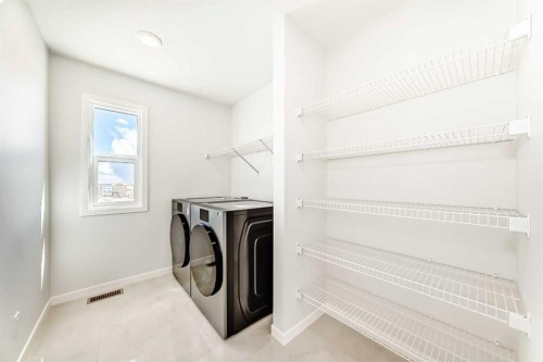 396 Herron Landing Ne, Calgary, AB - Indoor Photo Showing Laundry Room