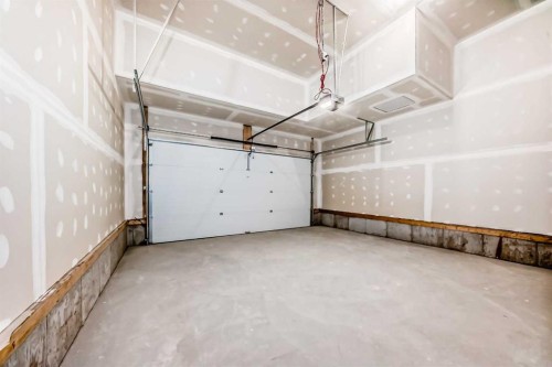 396 Herron Landing Ne, Calgary, AB - Indoor Photo Showing Garage