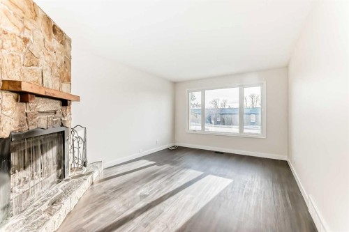 404 Acacia Drive Se, Airdrie, AB - Indoor With Fireplace