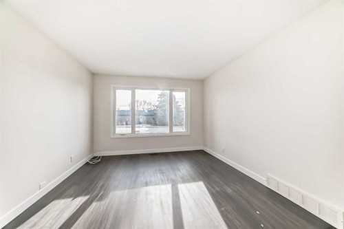 404 Acacia Drive Se, Airdrie, AB - Indoor Photo Showing Other Room