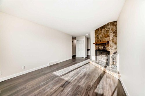 404 Acacia Drive Se, Airdrie, AB - Indoor With Fireplace