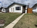 404 Acacia Drive Se, Airdrie, AB  - Outdoor With Exterior 
