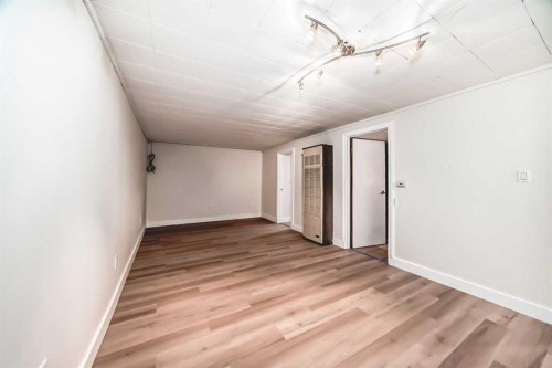 404 Acacia Drive Se, Airdrie, AB - Indoor Photo Showing Other Room