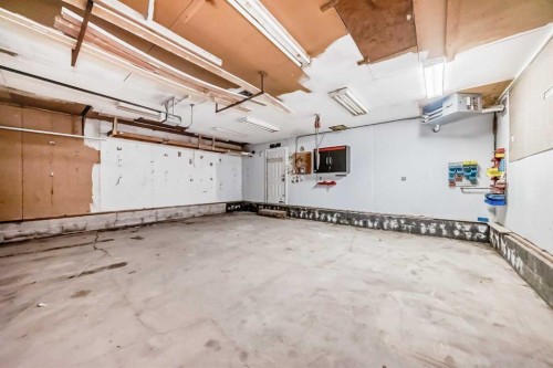 404 Acacia Drive Se, Airdrie, AB - Indoor Photo Showing Garage