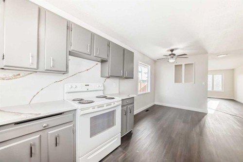 404 Acacia Drive Se, Airdrie, AB - Indoor Photo Showing Kitchen