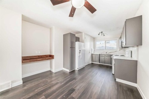 404 Acacia Drive Se, Airdrie, AB - Indoor Photo Showing Kitchen