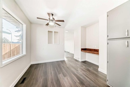 404 Acacia Drive Se, Airdrie, AB - Indoor Photo Showing Other Room