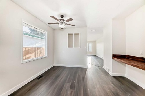 404 Acacia Drive Se, Airdrie, AB - Indoor Photo Showing Other Room