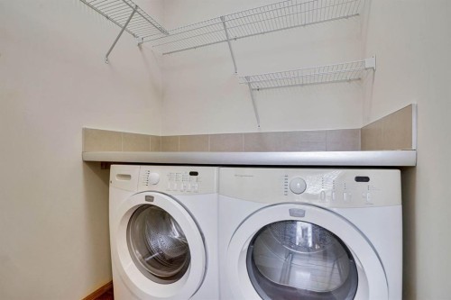43 Elgin View Se, Calgary, AB - Indoor Photo Showing Laundry Room